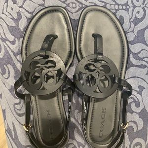 Black coach flat sandals